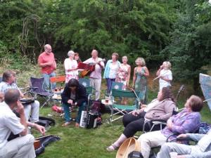 Rapsquillion, plus a couple of very welcome ex-alumni, Wendy Lund and Sue Lawrence, back from Zambia and Spain respectively, in the party mood at Hyssington, July 2013.